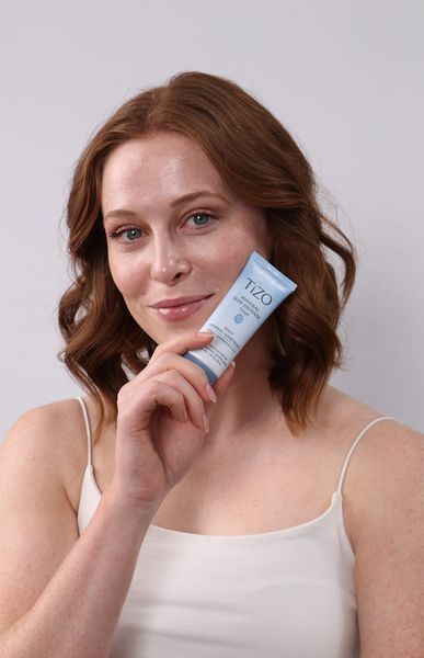 Крем мінеральний сонцезахисний з відтінком TiZO Mineral Sun Defense Tinted SPF 50 TZ03 фото